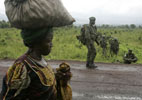 Woman, soldiers in eastern Congo - AP Woman, soldiers in eastern Congo - AP